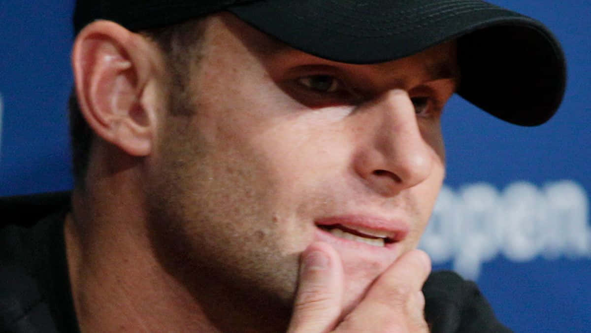 Andy Roddick Holding His Chin Wallpaper