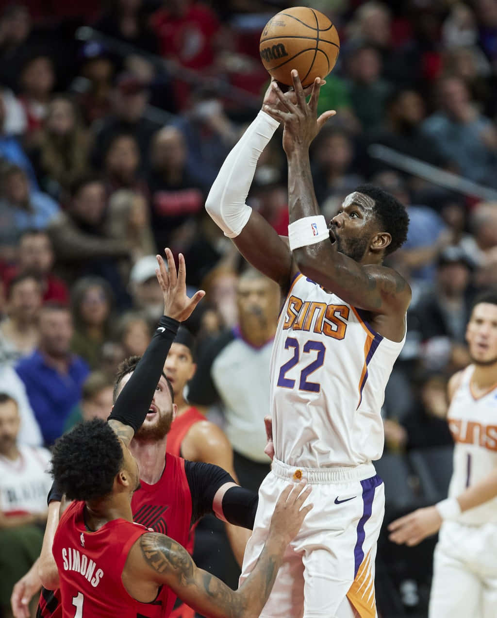 Anfernee Simons Defending Sun's Deandre Ayton Wallpaper