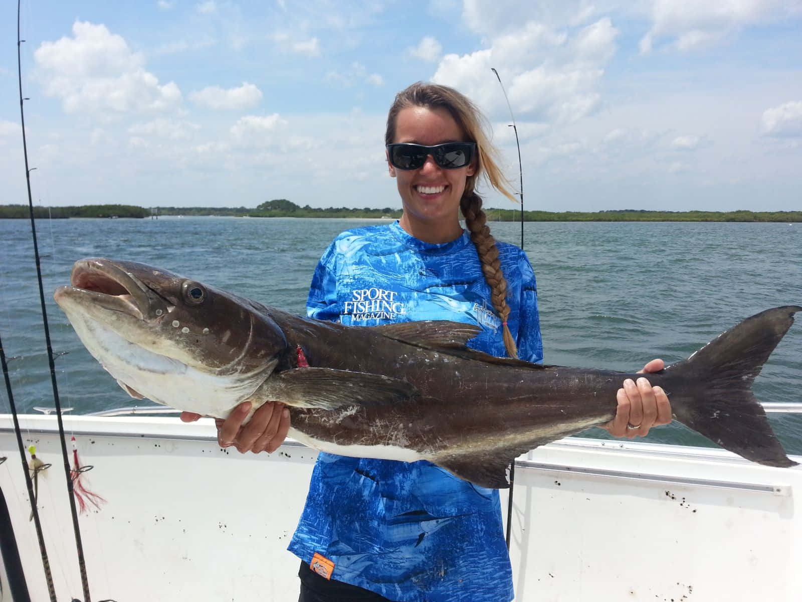 Anglerwith Caught Cobia Wallpaper