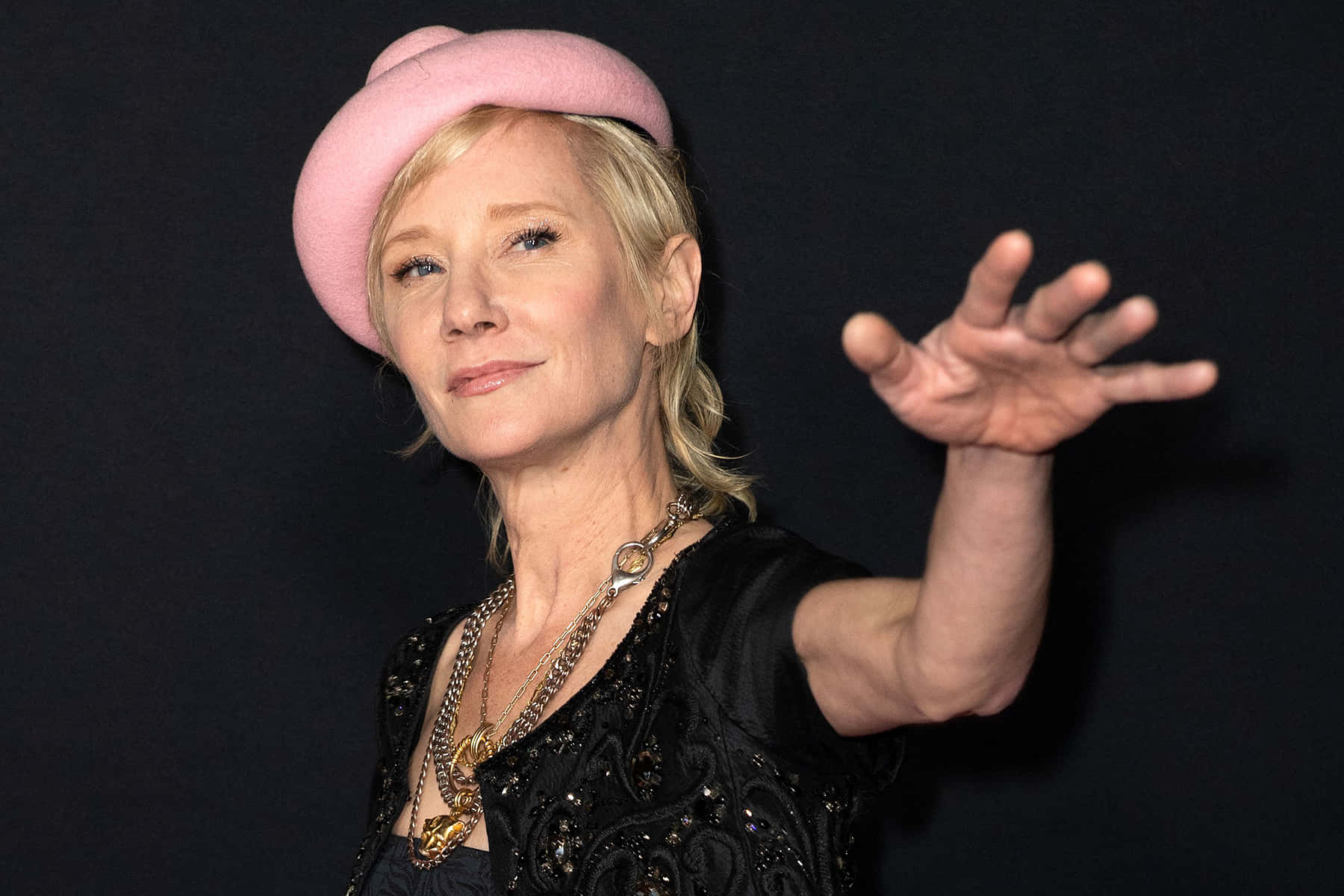 Anne Heche Wearing Pink Fedora Hat Wallpaper