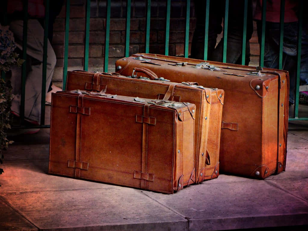 Antique Brown Leather Suitcases Wallpaper