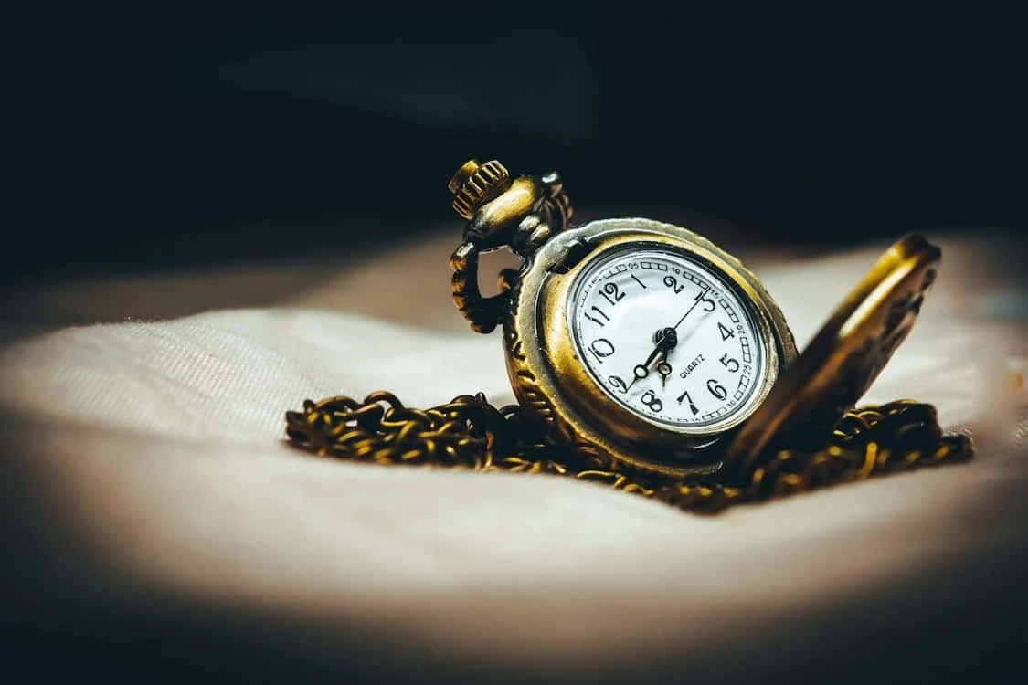 Antique Pocket Watch Elegance Wallpaper