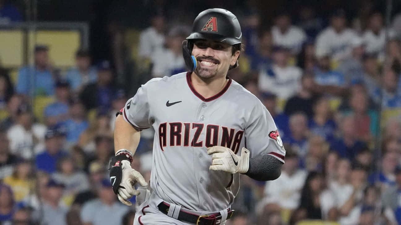 Arizona Diamondbacks Player Smiling While Running Wallpaper