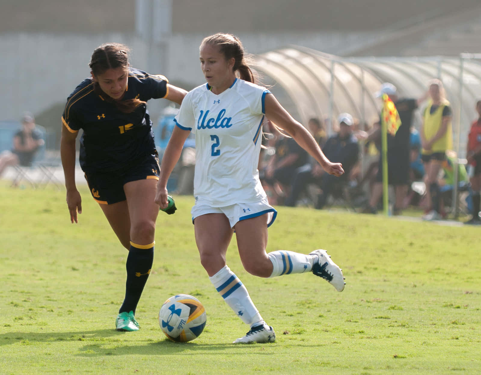 Ashley Sanchez Demonstrating Her Brilliant Skills On The Soccer Field. Wallpaper