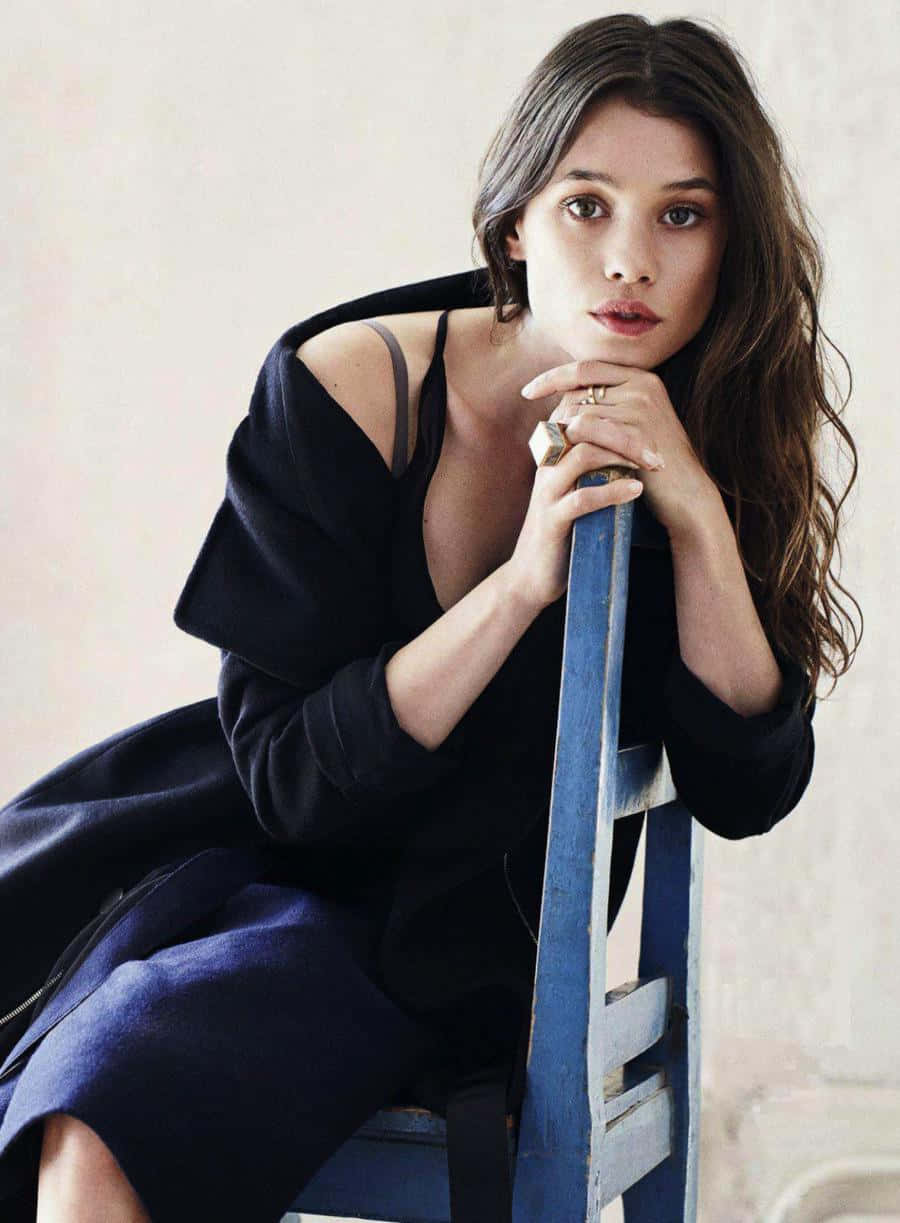 Astrid Berges-frisbey Striking A Pose In A Stylish Outfit Wallpaper