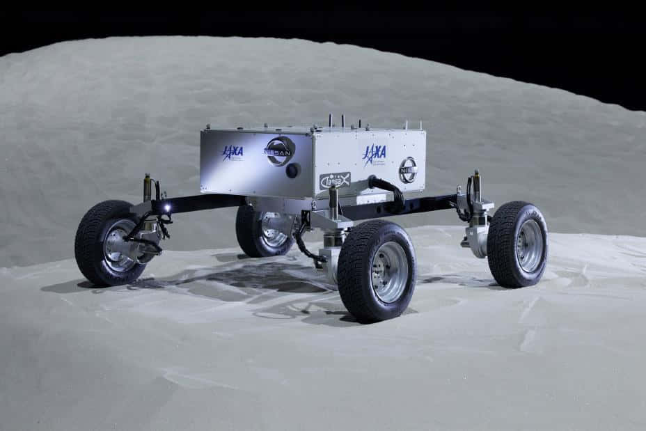 Astronaut Driving The Lunar Rover On The Moon's Surface. Wallpaper