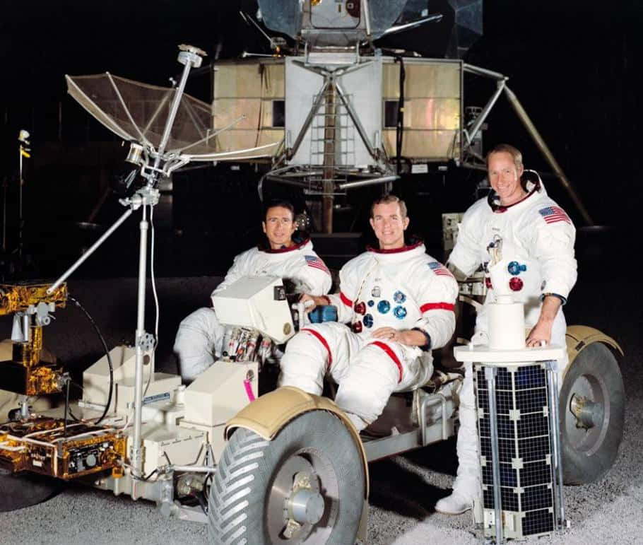 Astronaut Operating A Lunar Rover On The Moon's Surface Wallpaper