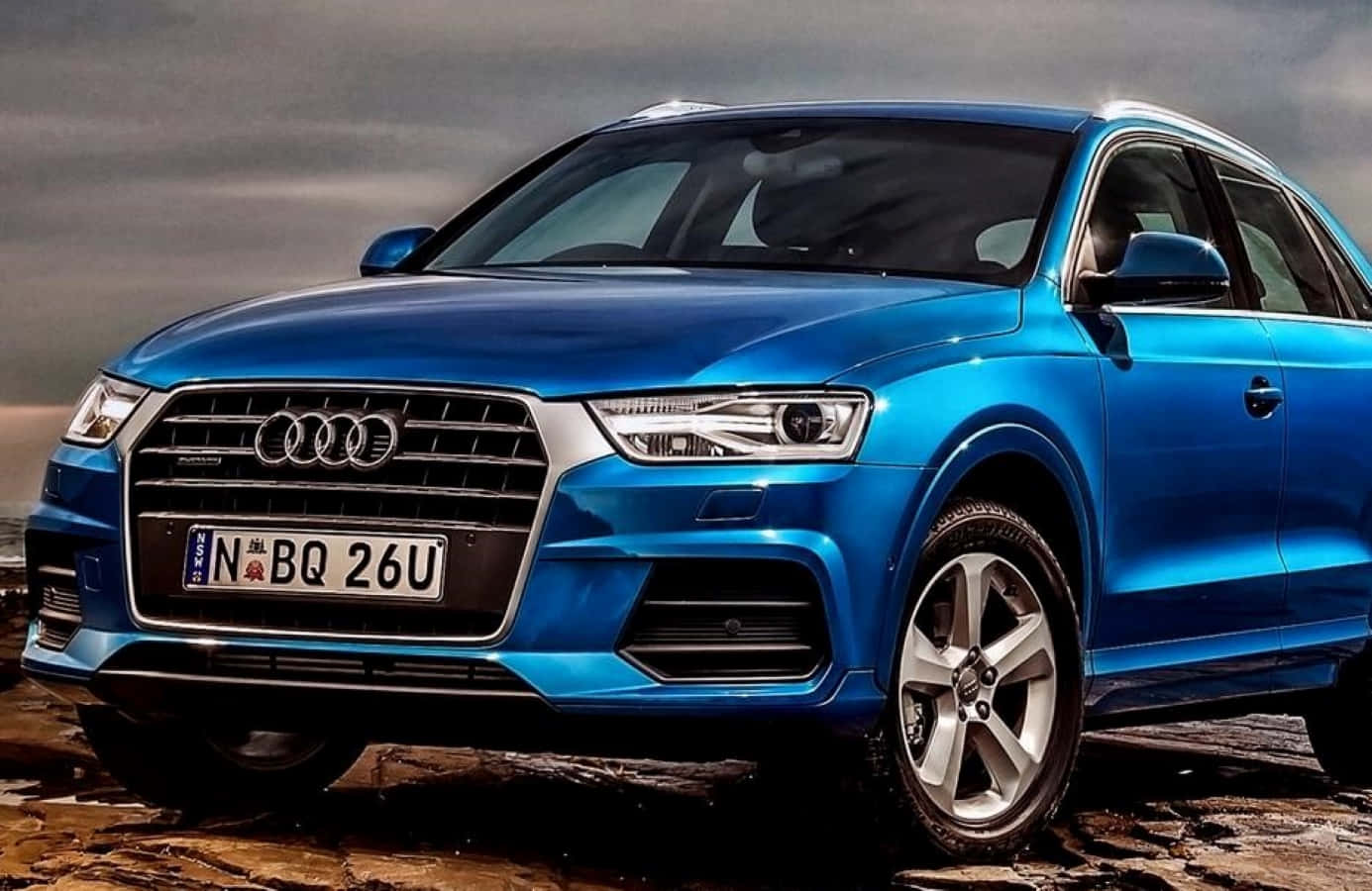 Audi Q5 Luxury Suv On The Road Wallpaper