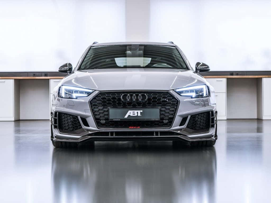 Audi Rs5 In Action: Unleashing Power And Elegance Wallpaper