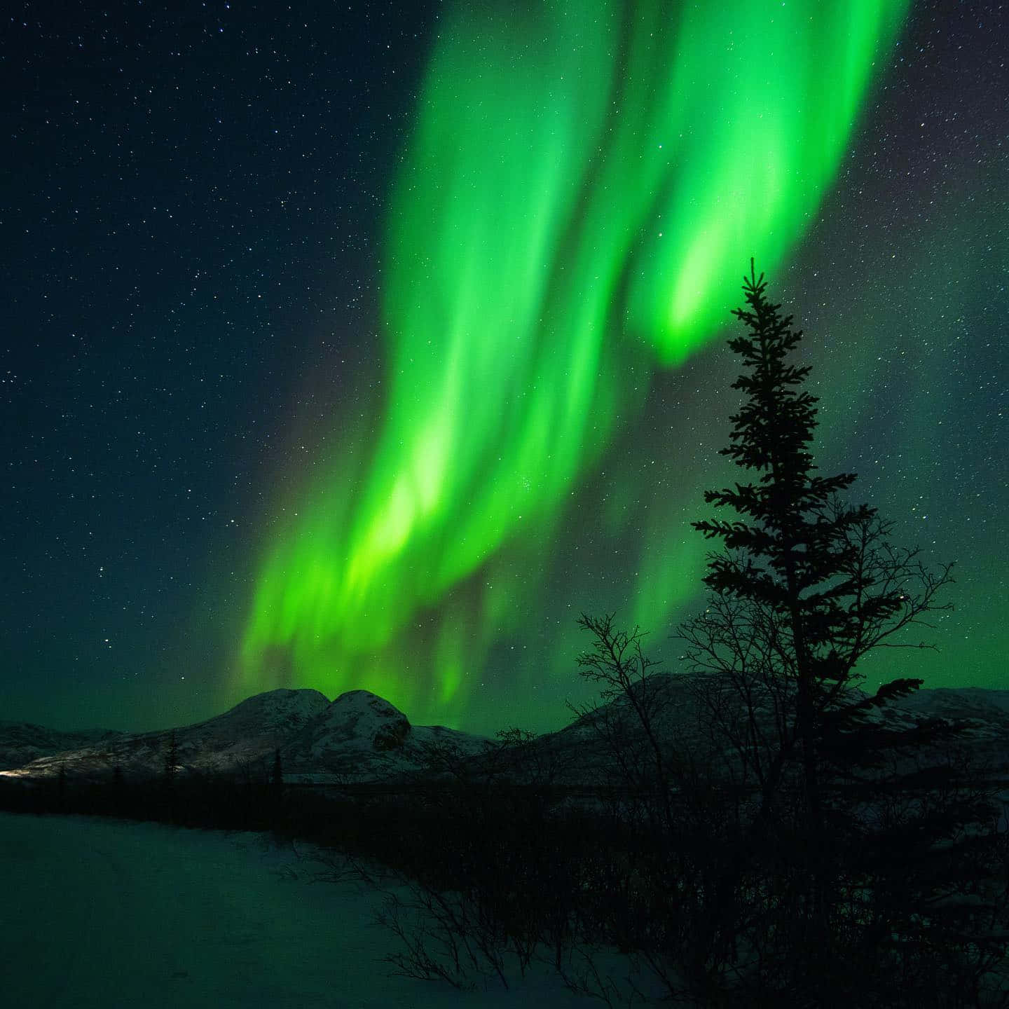 Aurora Australis Over Mountainous Landscape Wallpaper