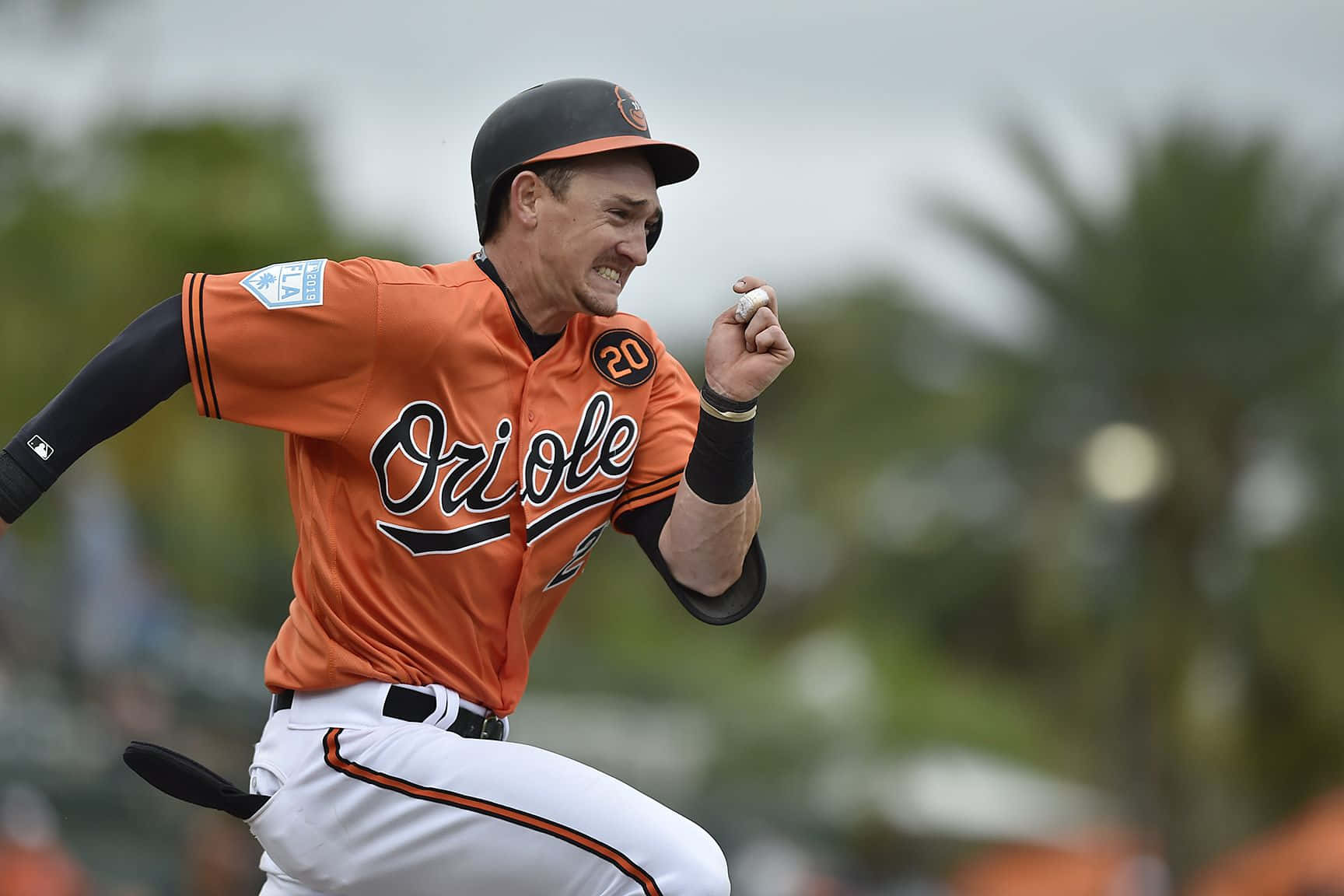 Austin Hays In Action At A Baseball Game Wallpaper