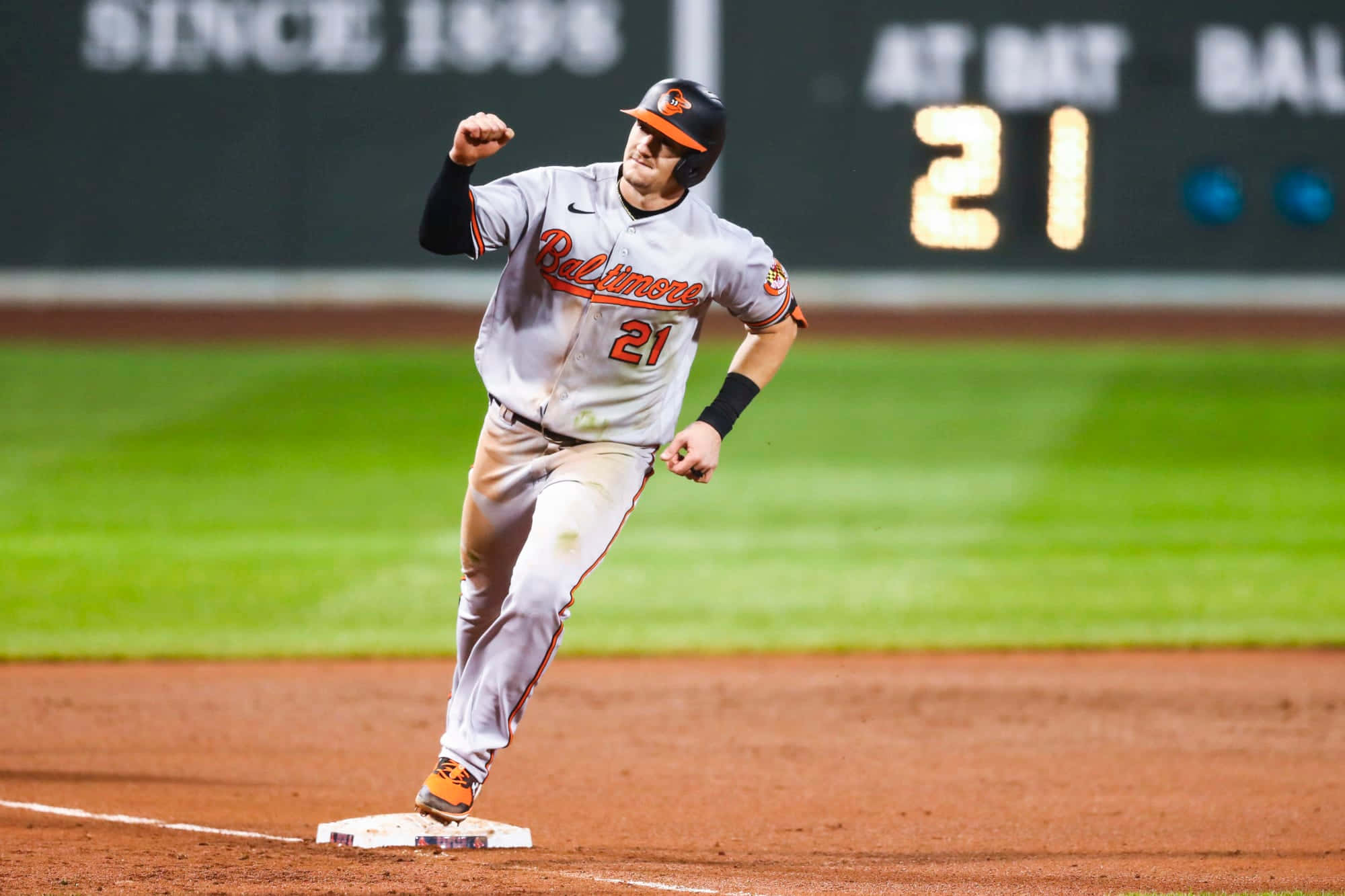 Austin Hays In Action During A Baseball Game Wallpaper