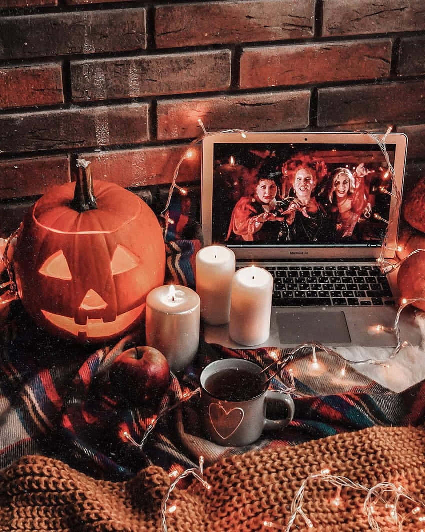 Autumnal Cozy Workspace Halloween Vibes Wallpaper