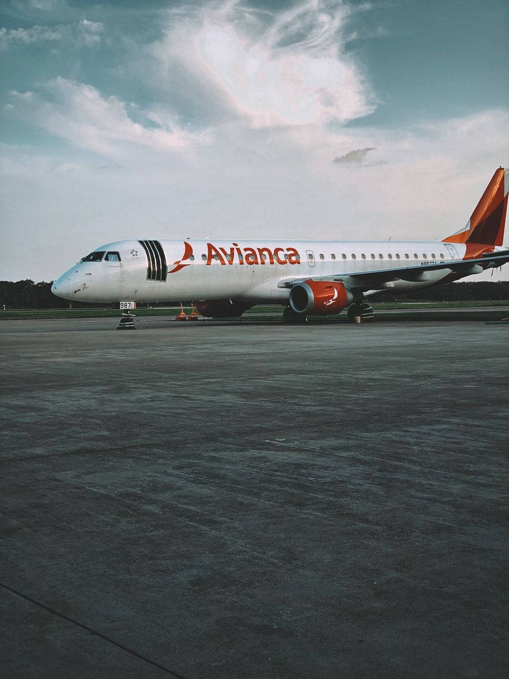 Avianca Airline Plane Beneath Cloudy Sky Wallpaper