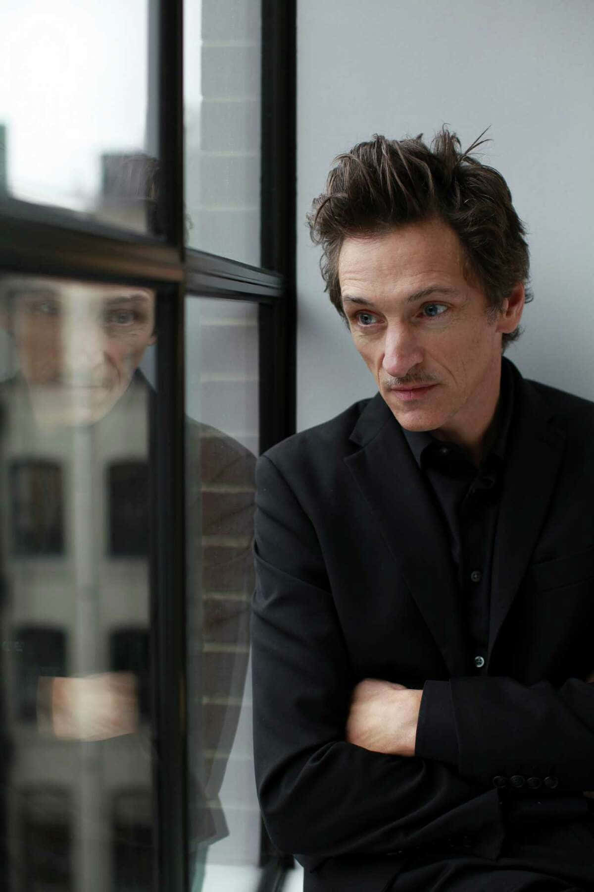 Award-winning Actor John Hawkes Posing For The Camera. Wallpaper