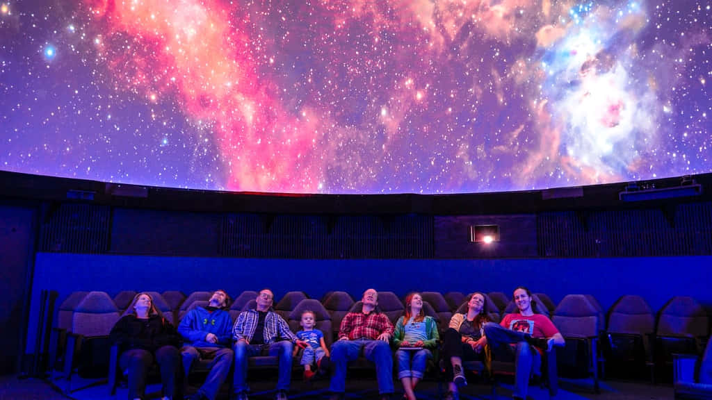 Awe-inspiring Night Sky At The Planetarium Wallpaper