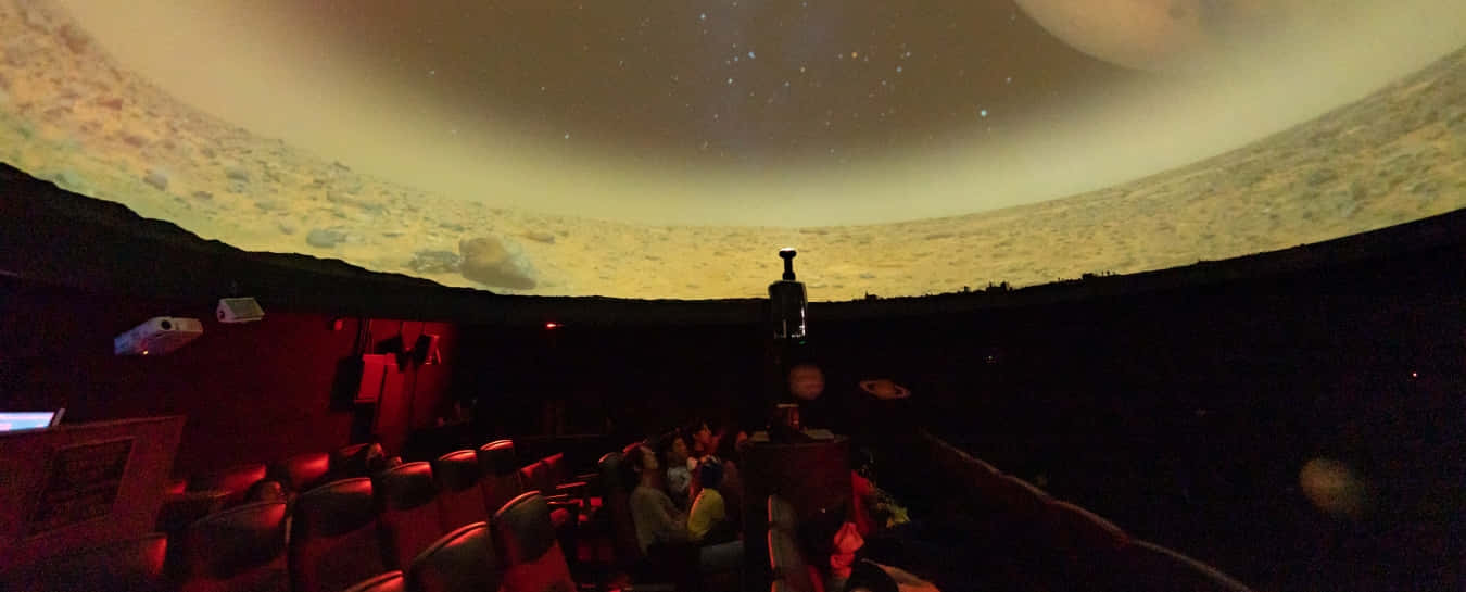 Awe-inspiring Planetarium Projection Of The Cosmos Wallpaper