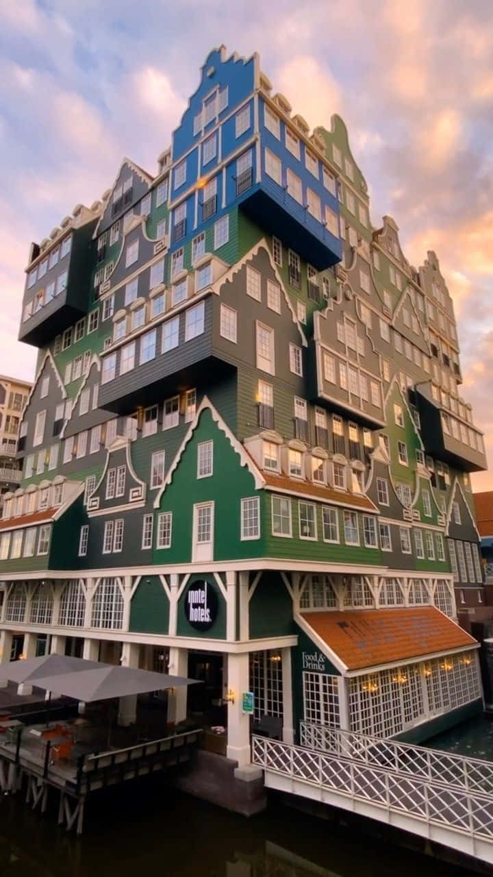 Awe-inspiring View Of Inntel Hotel, Zaandam Under A Dreamy Sky. Wallpaper