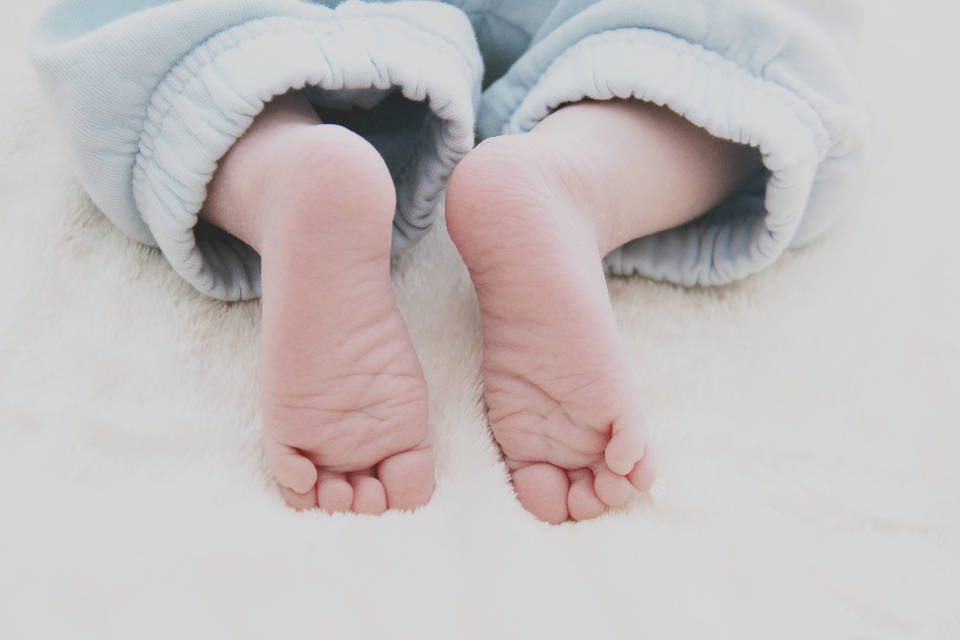 Baby Boy In Blue Pyjamas Wallpaper