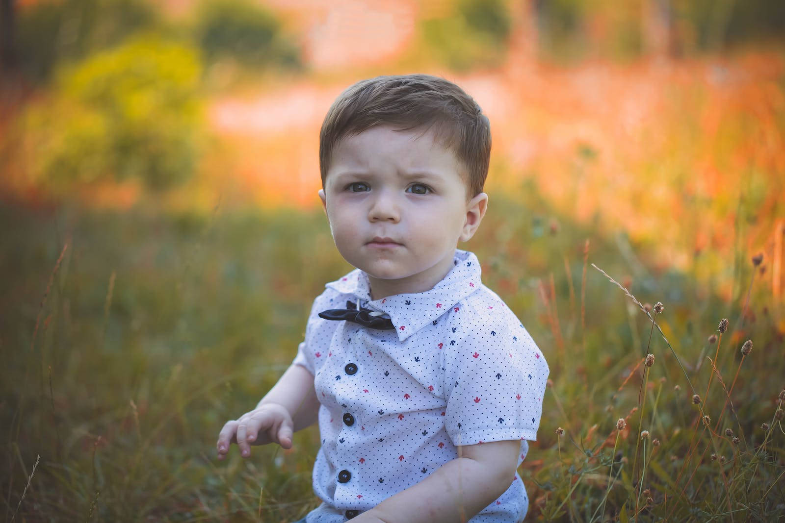 Baby Boy Wearing White Polo Wallpaper