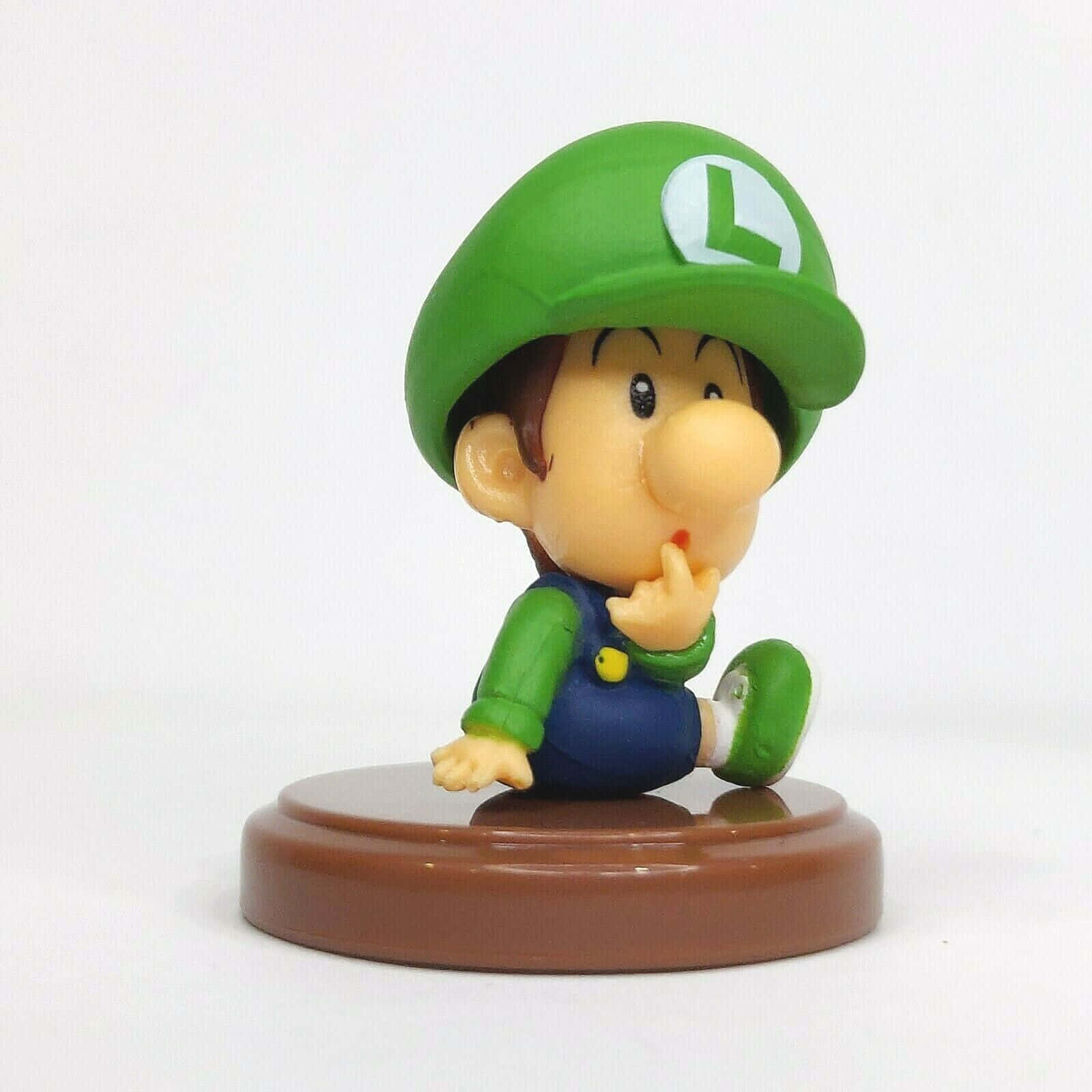 Baby Luigi Figure Thinking Pose Wallpaper