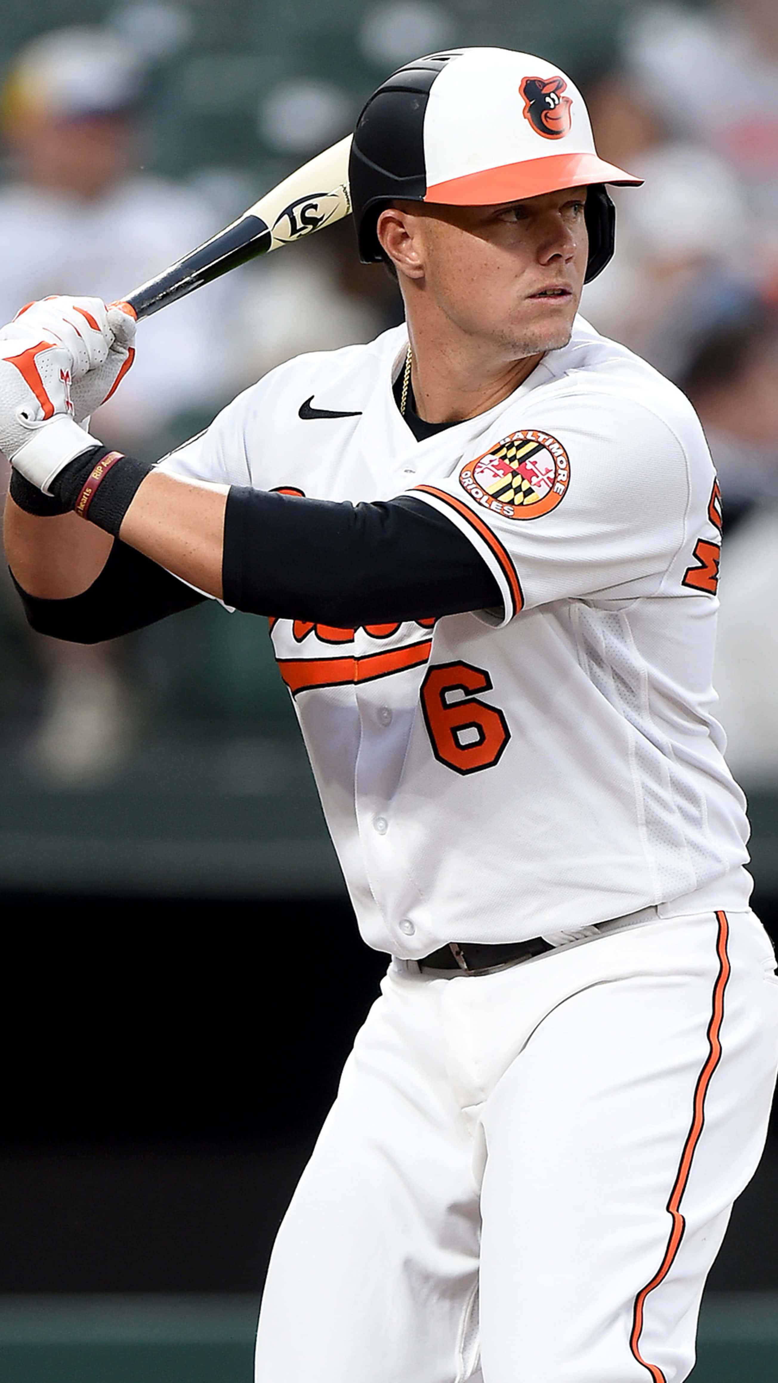 Baltimore Orioles' Star Player Ryan Mountcastle In Action Wallpaper