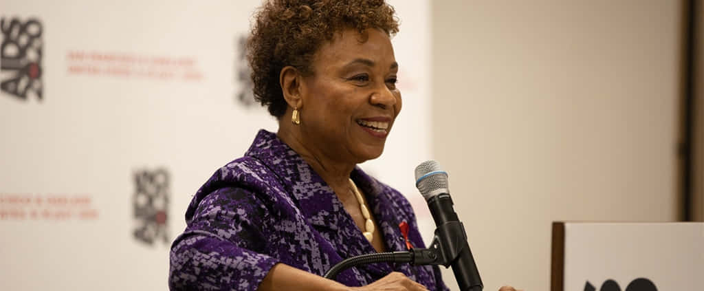 Barbara Lee Smiling During Press Conference Wallpaper