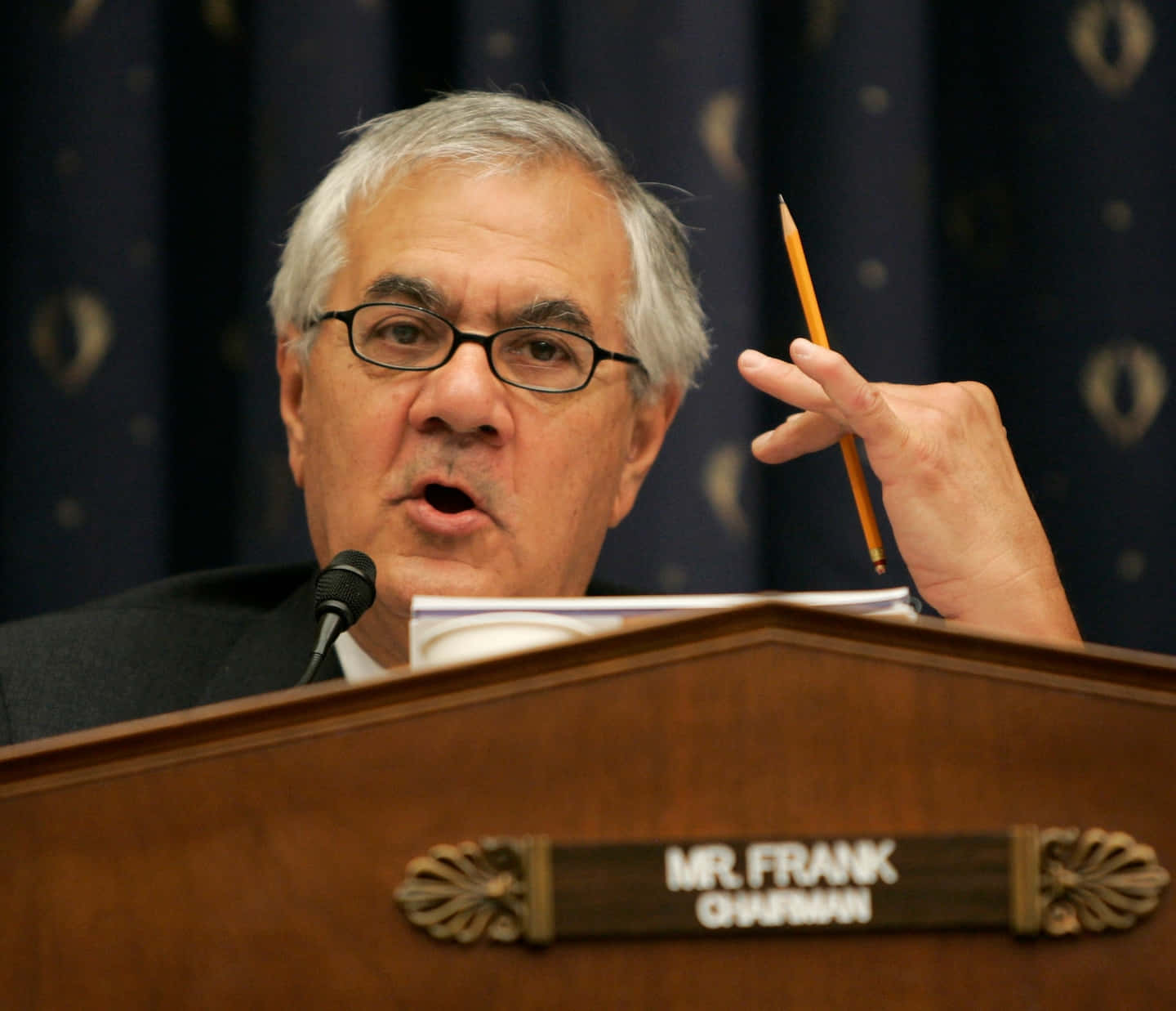 Barney Frank Holding A Pencil Wallpaper