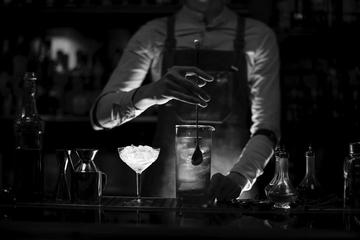 Bartender Mixing Cocktailin Monochrome Wallpaper