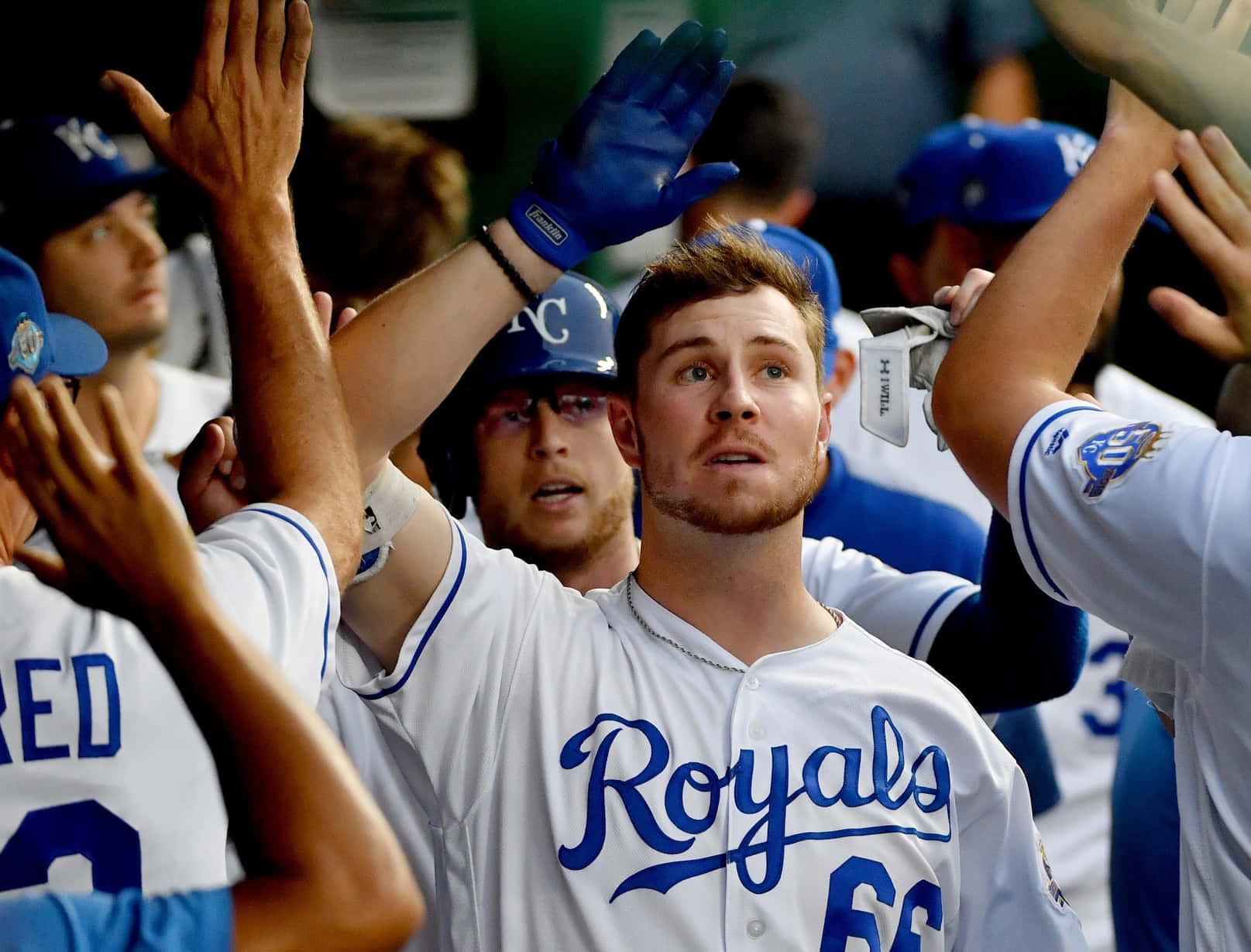 Baseball Player Celebratingwith Team Wallpaper