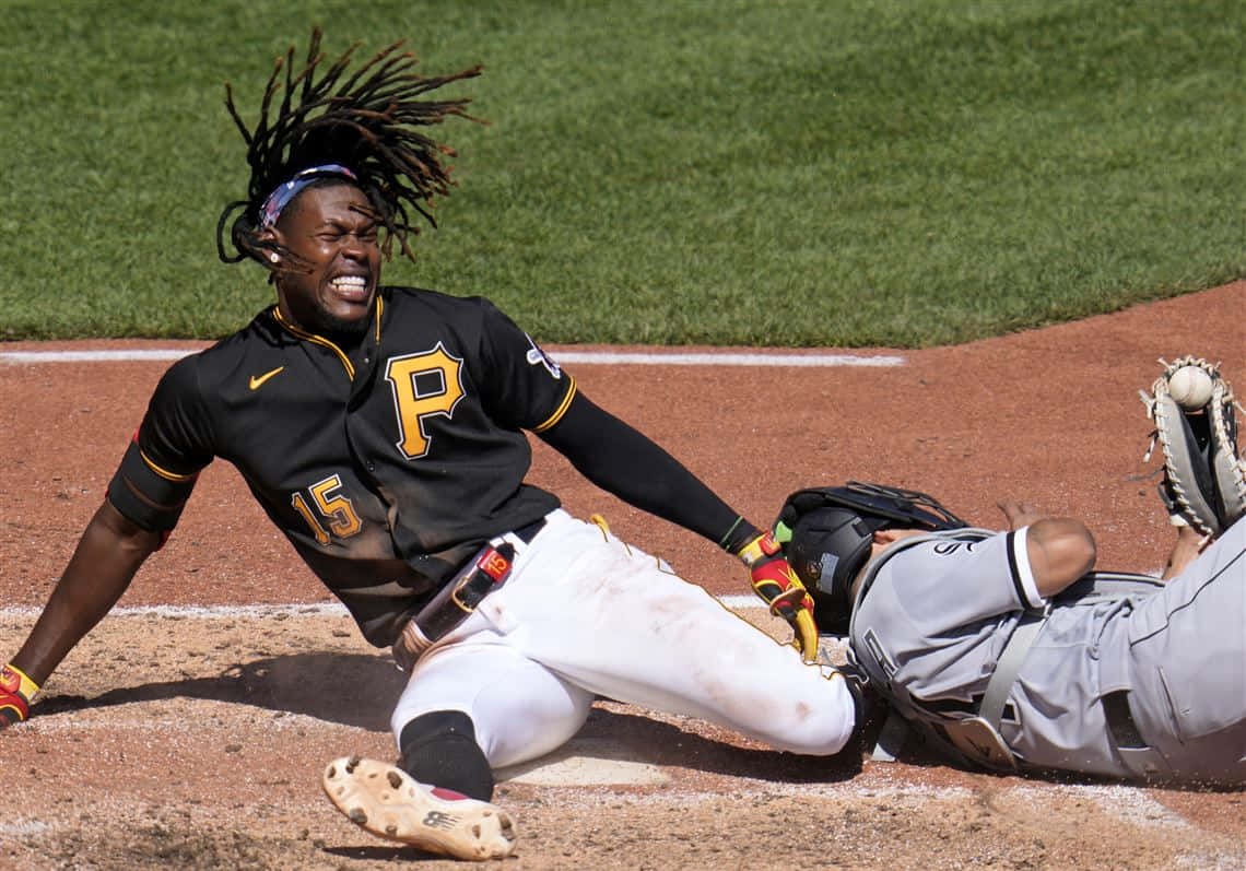 Baseball Player Sliding Into Base Wallpaper