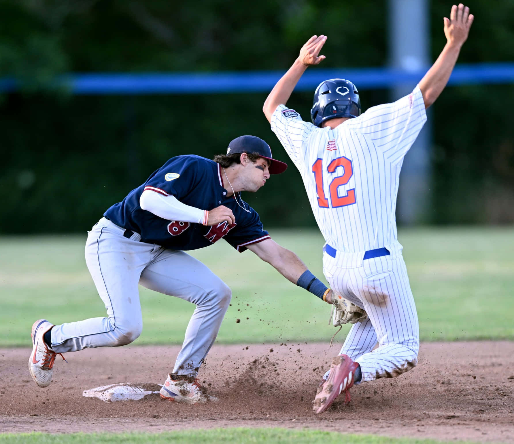 Baseball Player Sliding Into Second Base Wallpaper