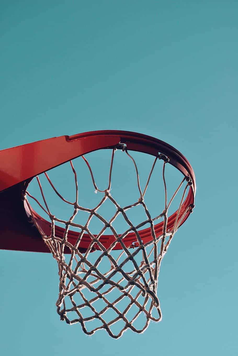 Basketball Hoop Against Blue Sky Wallpaper