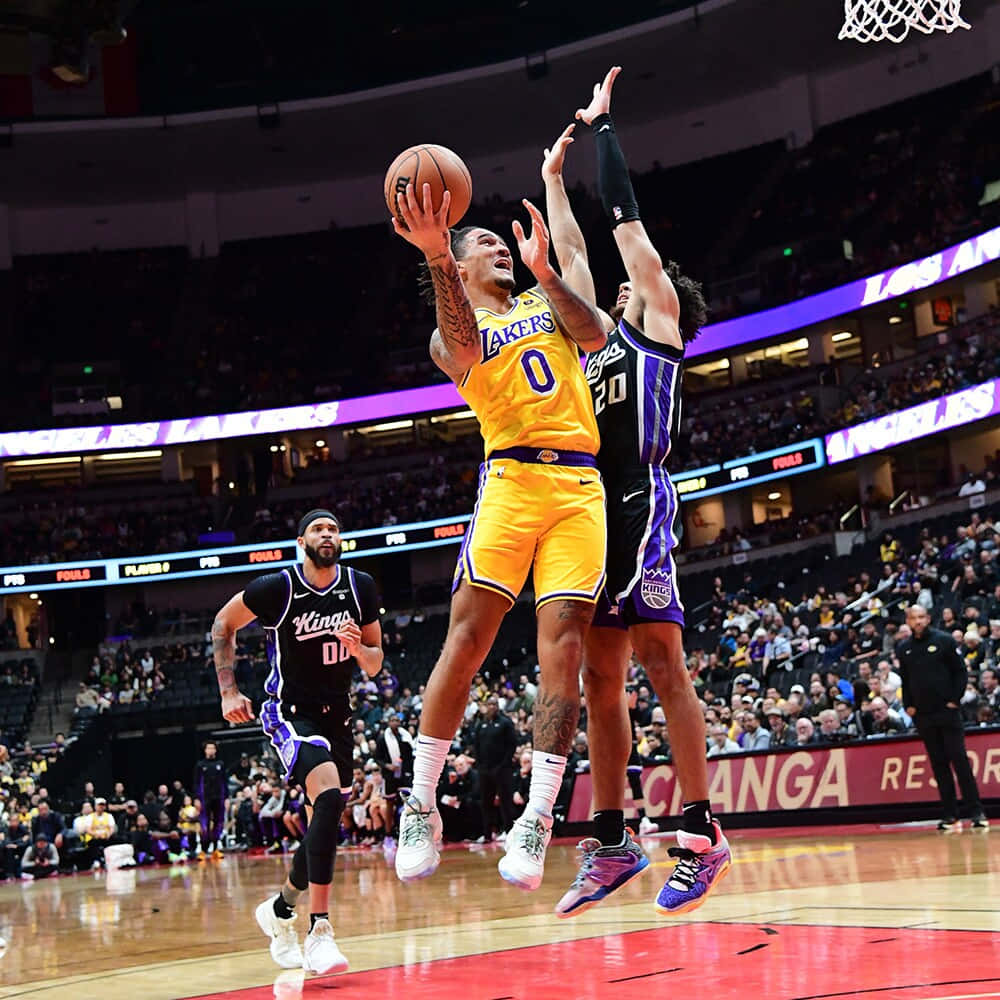 Basketball Layup Action Lakersvs Kings Wallpaper