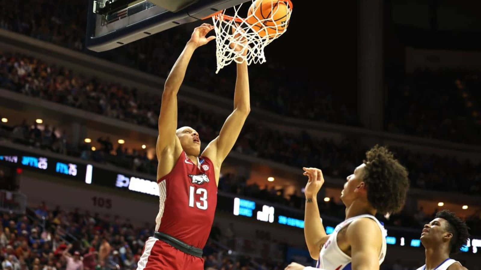 Basketball Player Dunking During Game Wallpaper