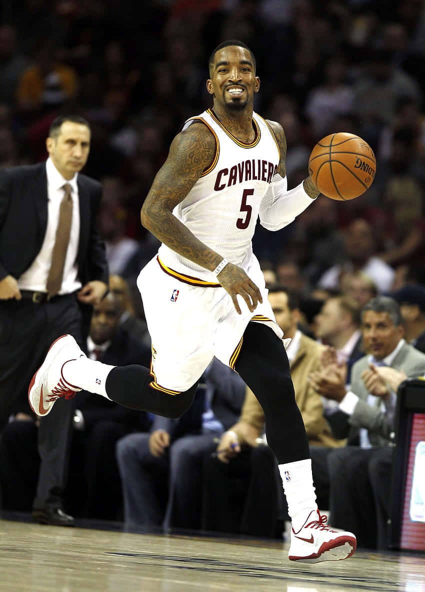 Basketball Player In Action Cleveland Cavaliers Wallpaper