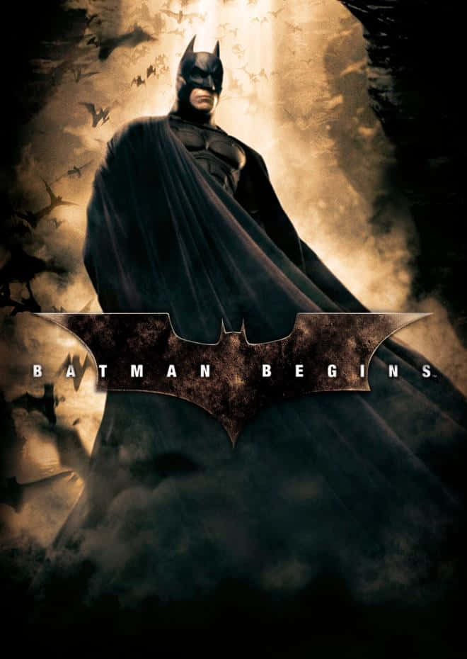 Batman Perched On A Rooftop, Overlooking The City In Batman Begins Wallpaper