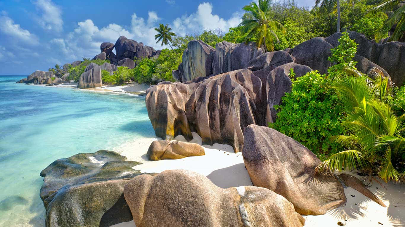 Beach In Apia With Huge Rocks Wallpaper