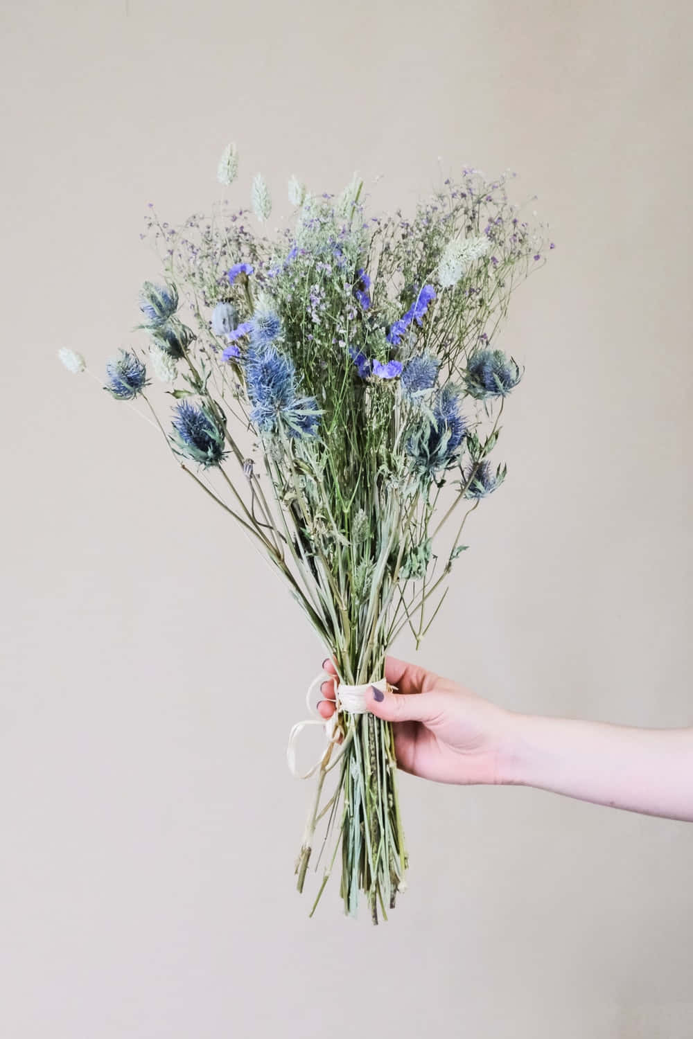 Beautiful Dried Flowers Arrangement On Rustic Wooden Table Wallpaper