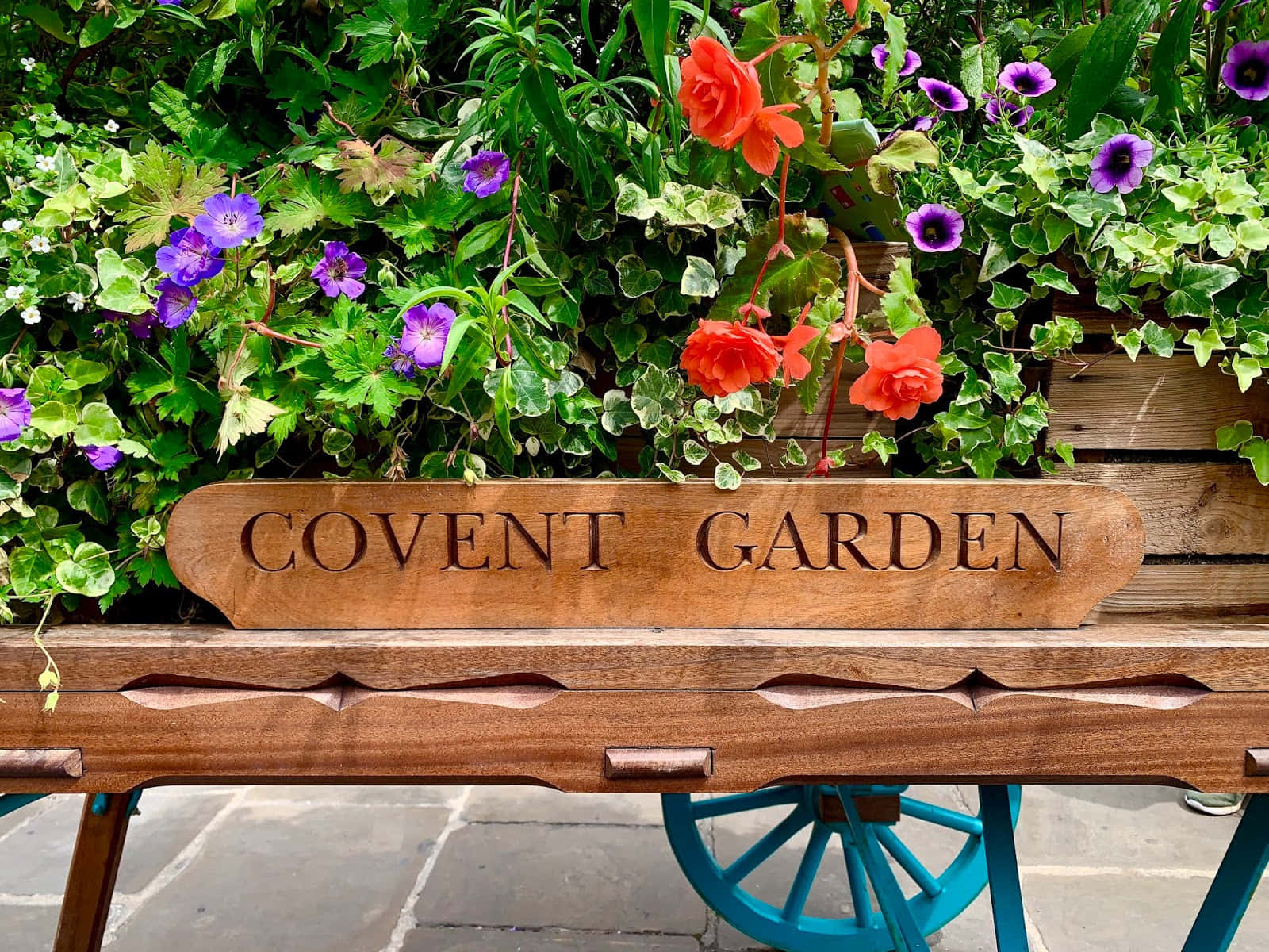 Beautiful Flower Cart In A Blooming Garden Wallpaper