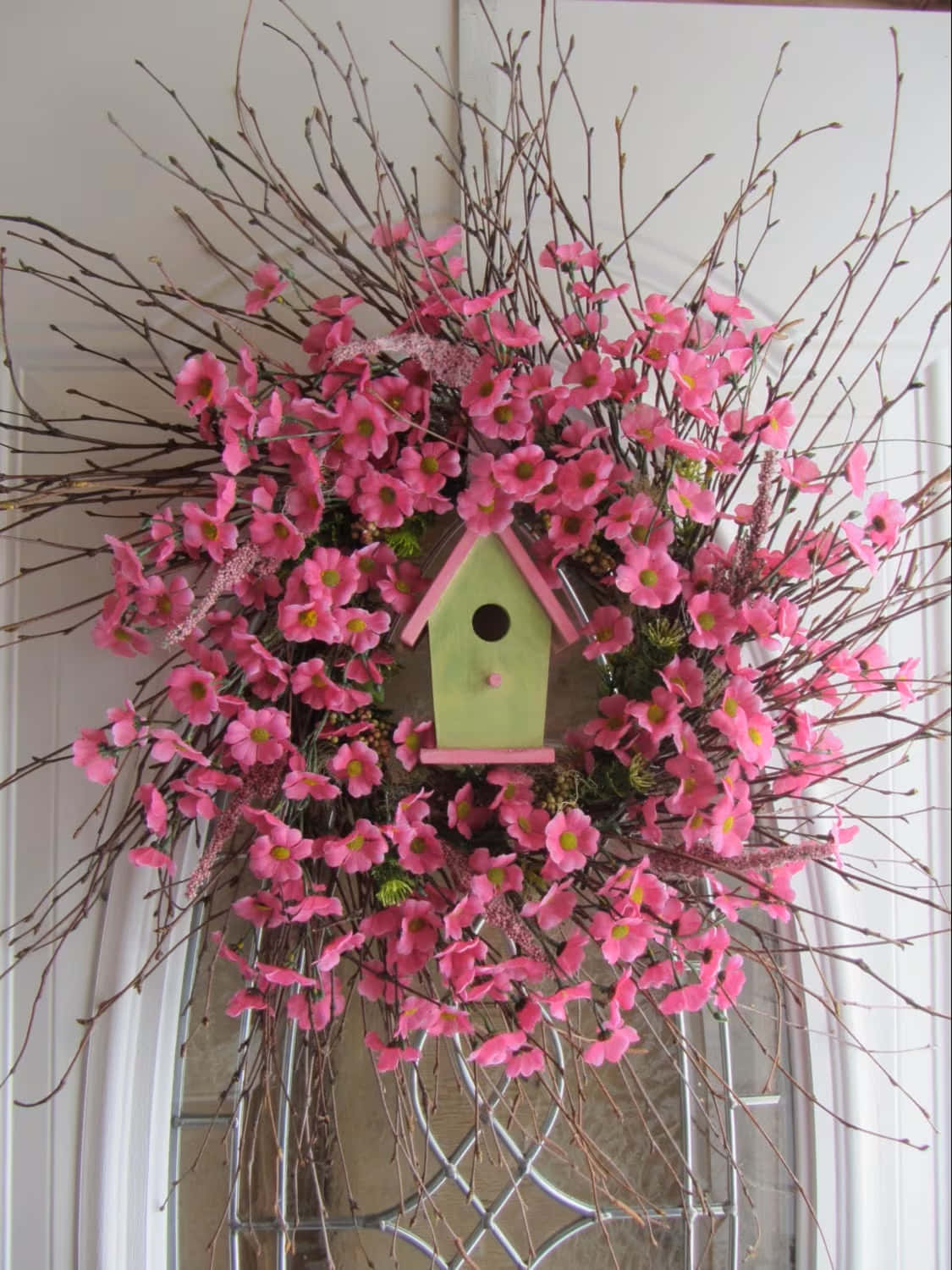 Beautiful Handcrafted Spring Wreath On Wooden Door Wallpaper