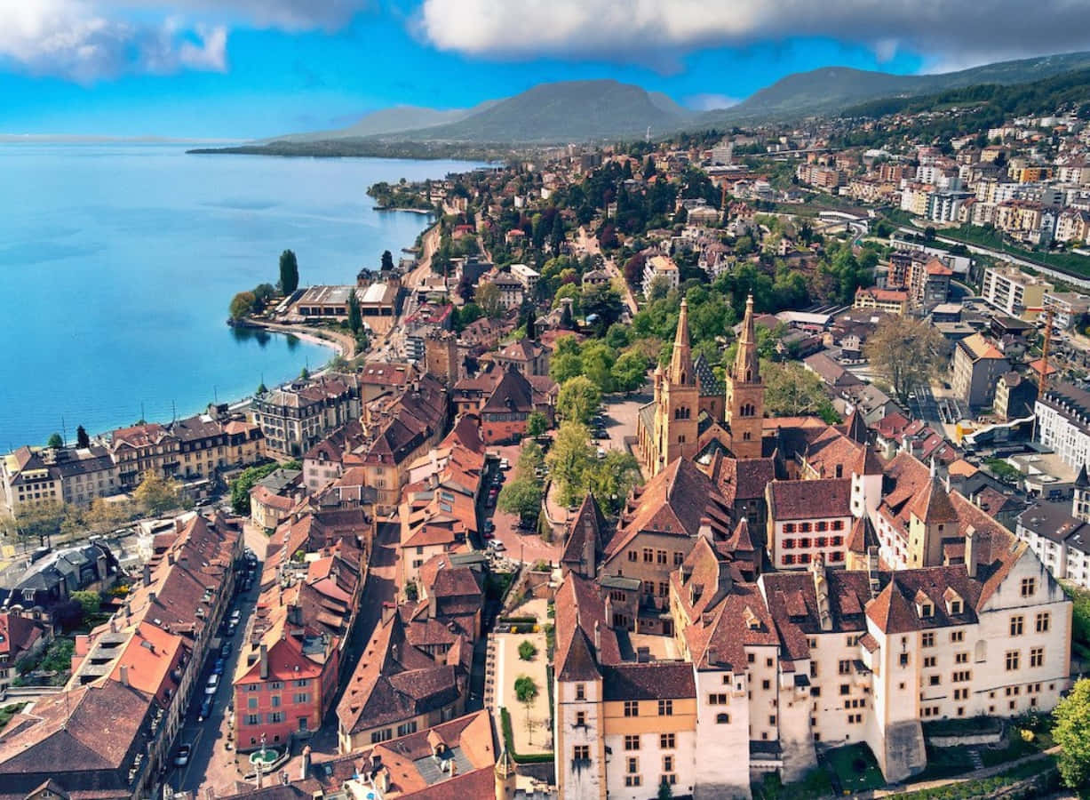 Beautiful Lake Neuchâtel Scene During Sunset Wallpaper