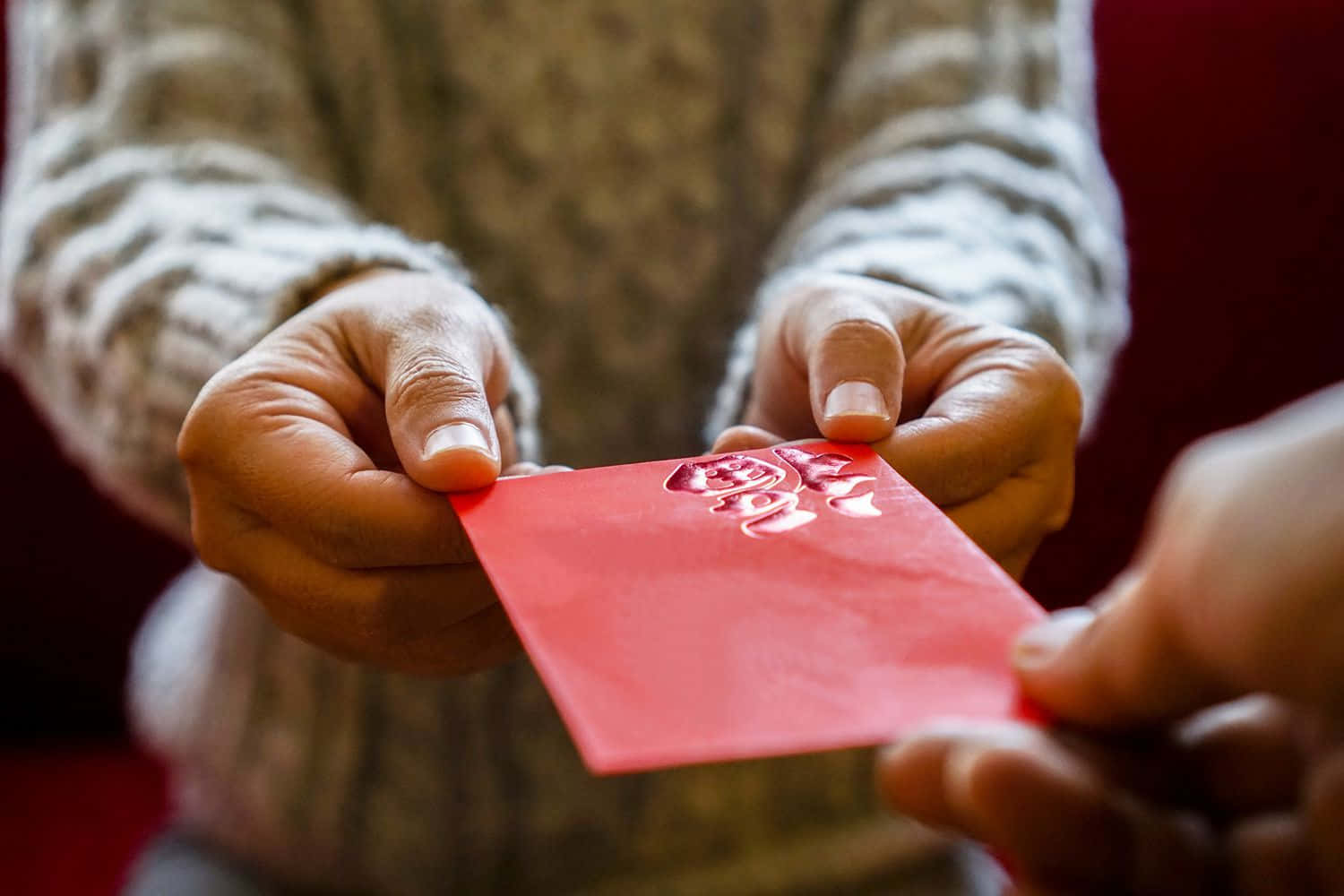 Beautiful Red Envelope On A Reflective Surface Wallpaper