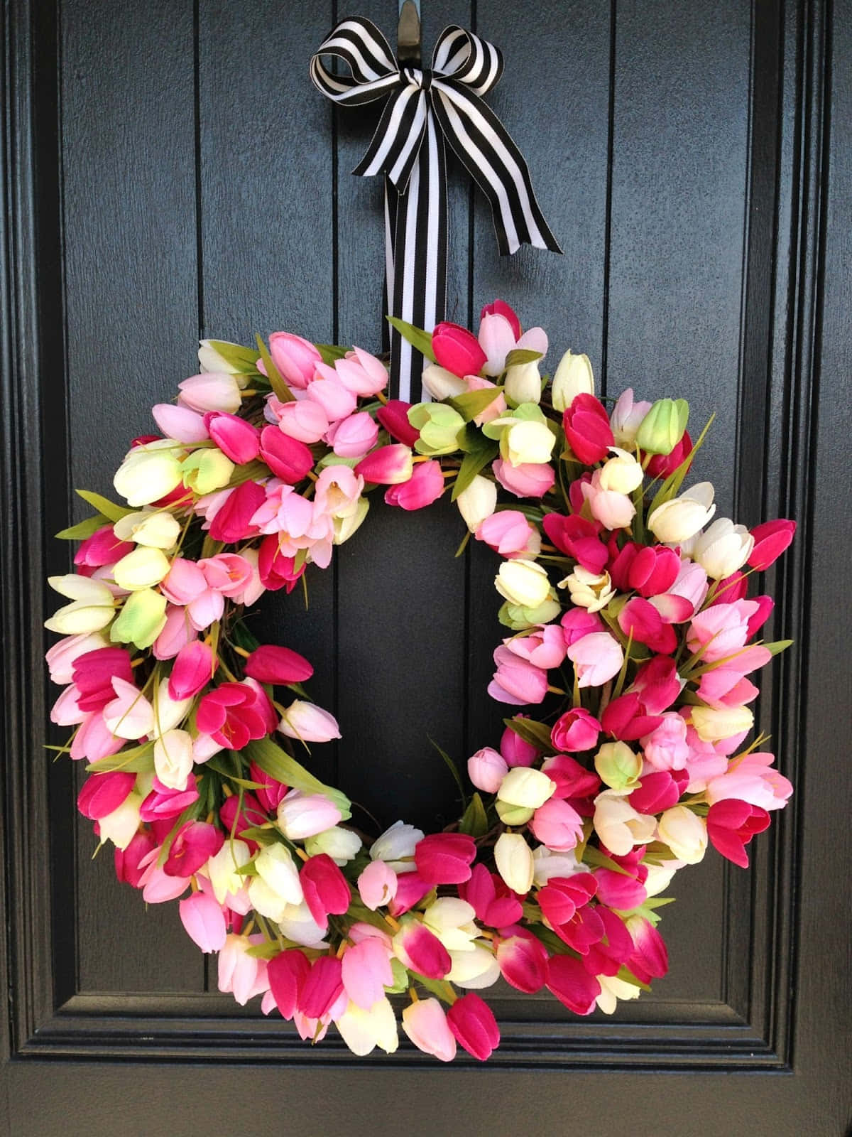 Beautiful Spring Wreath On A Rustic Wooden Door Wallpaper