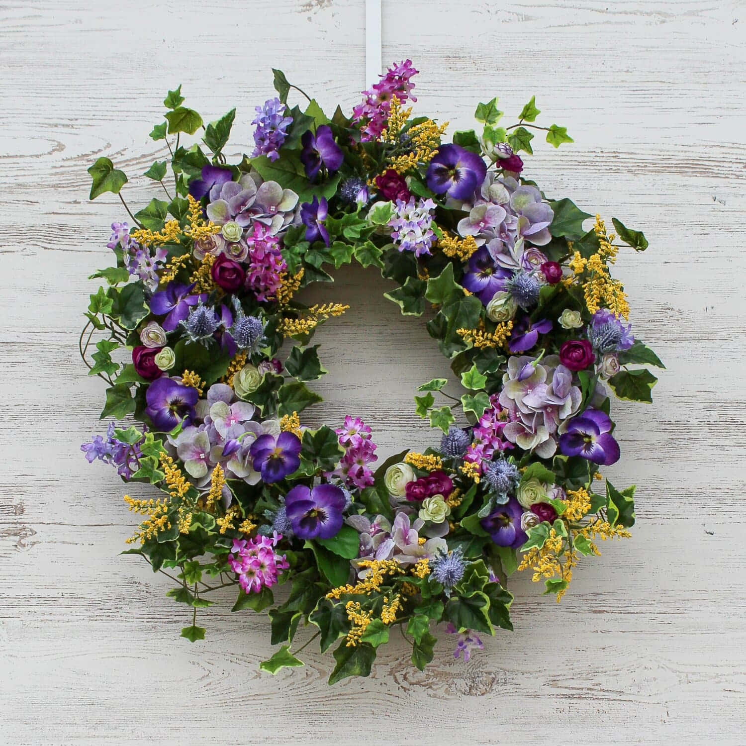 Beautiful Spring Wreath On A Wooden Door Wallpaper