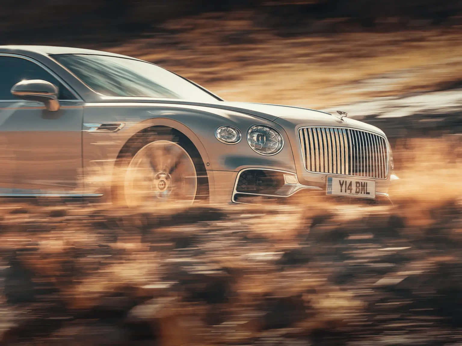 Bentley Flying Spur - A Pinnacle Of Luxury And Performance Wallpaper