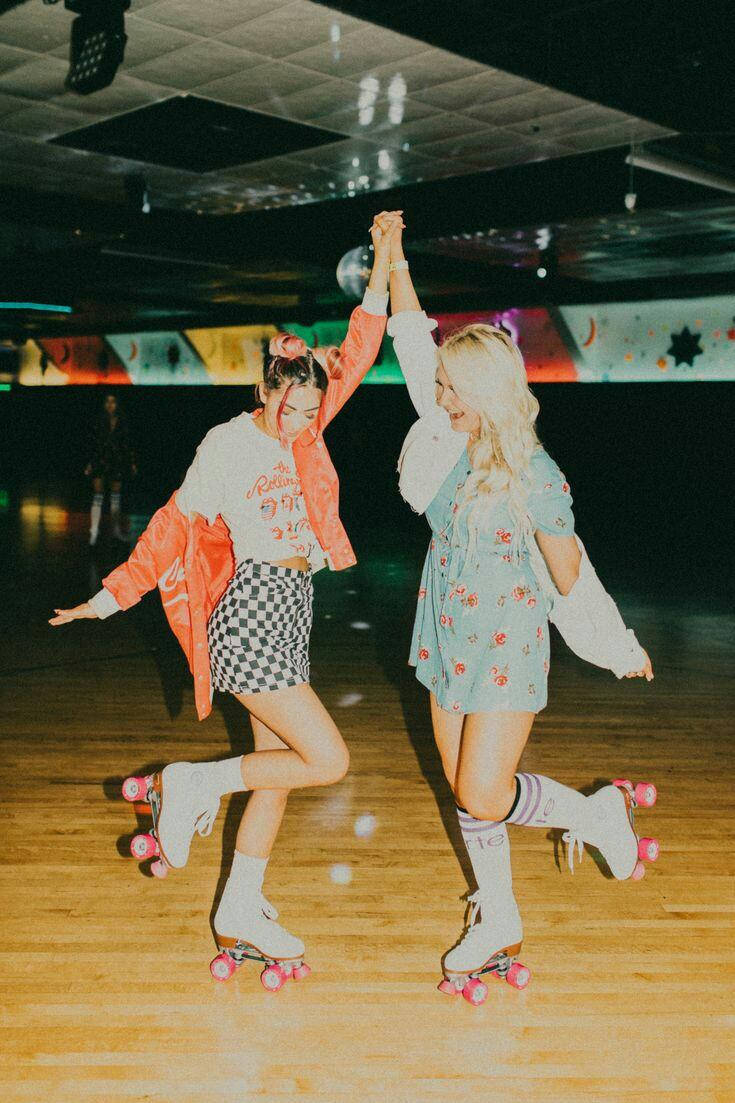 Bffs Having Fun: Roller Skating Adventure Wallpaper