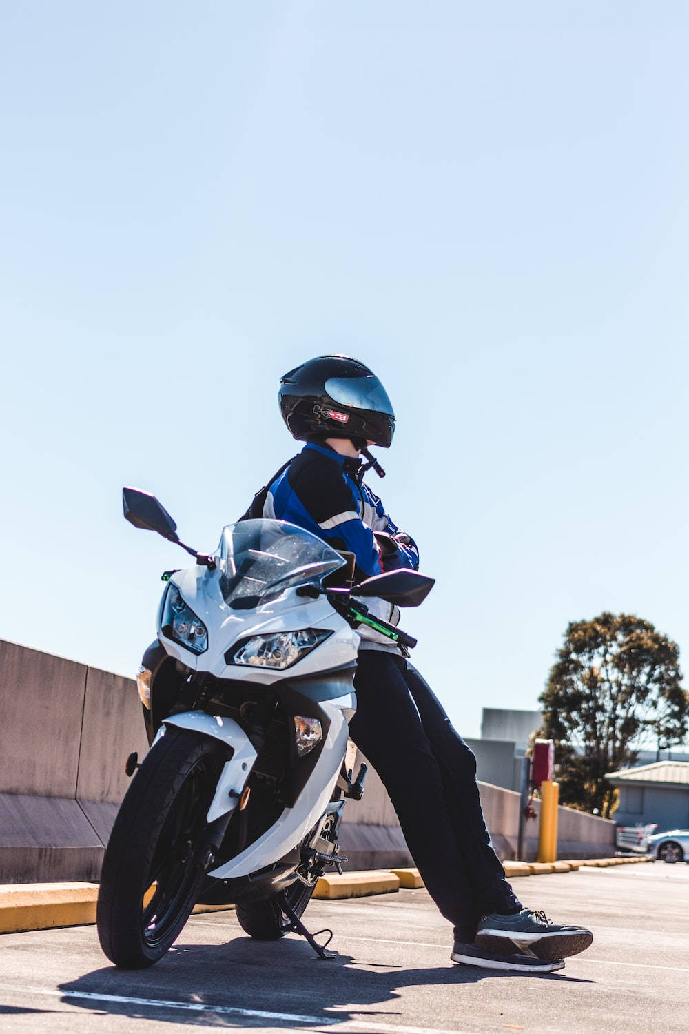 Bike Lover With A White Motorcycle Wallpaper