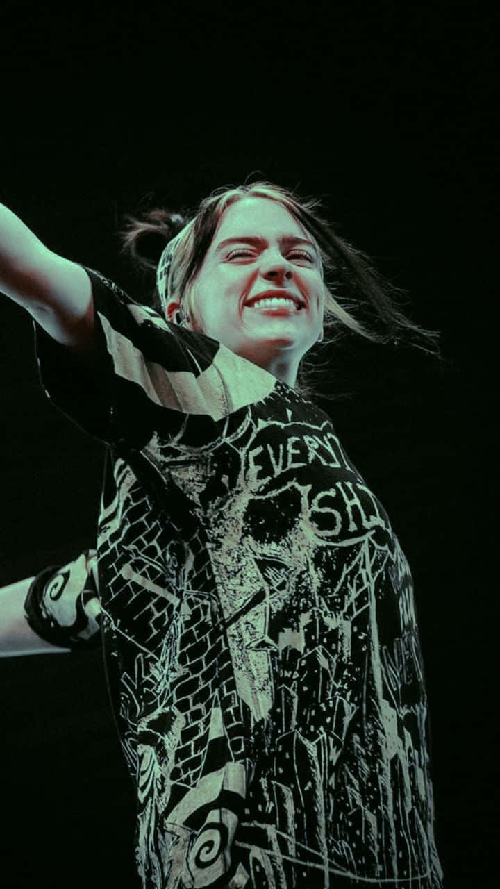 Billie Eilish Adorably Grinning Wallpaper