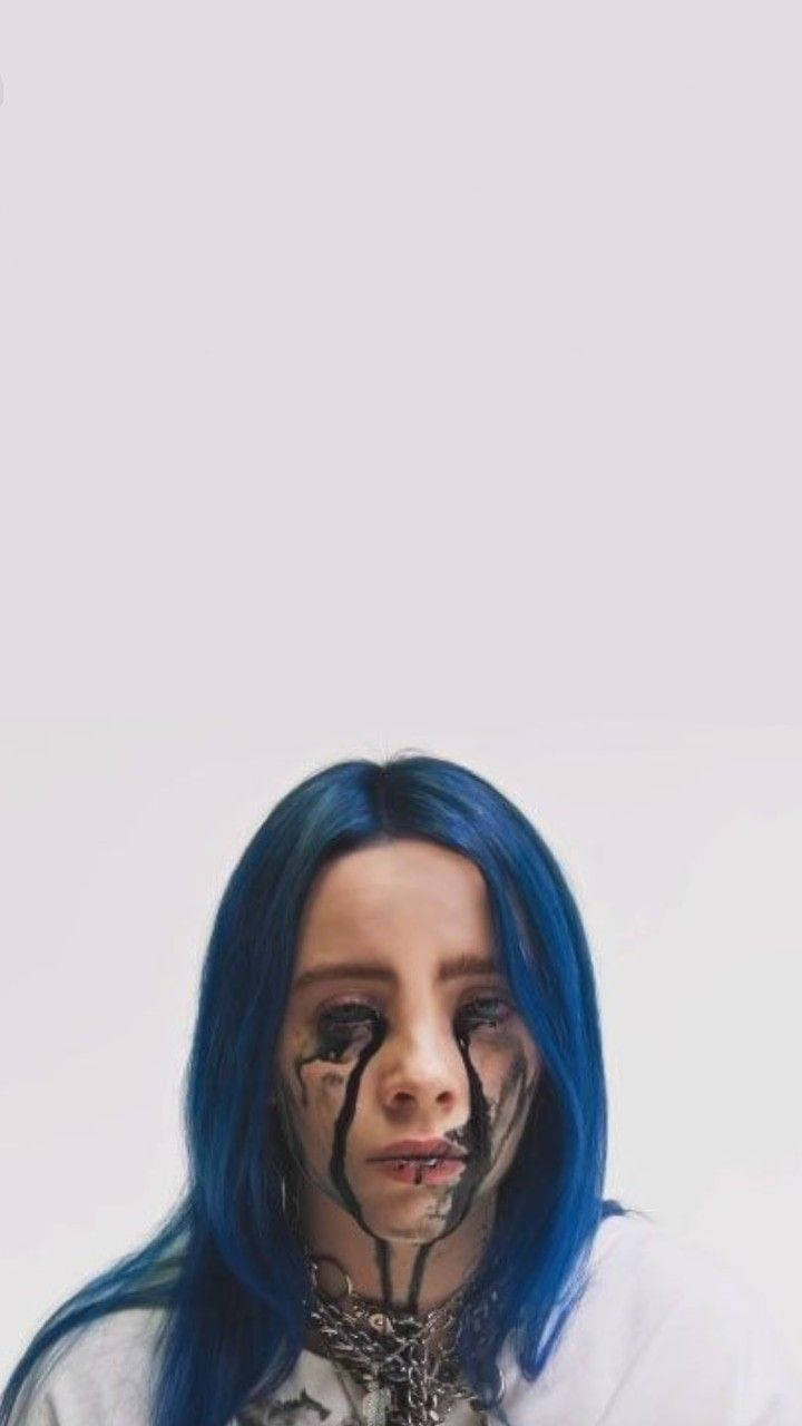 Billie Eilish Performing On Stage Wallpaper